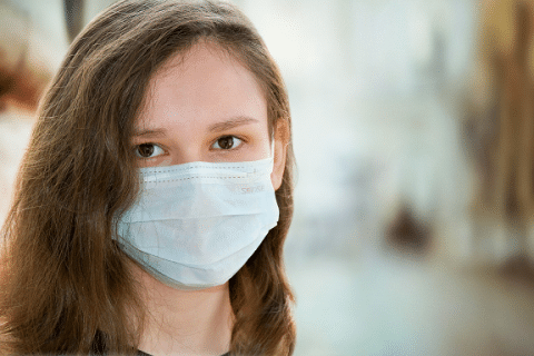 An image of a person wearing a face mask.