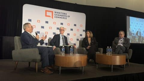 speaker panel sitting on stage