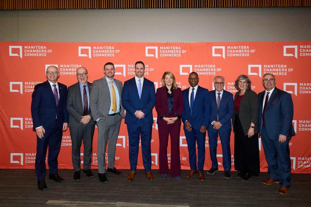 government officials pose with Melanie Joly