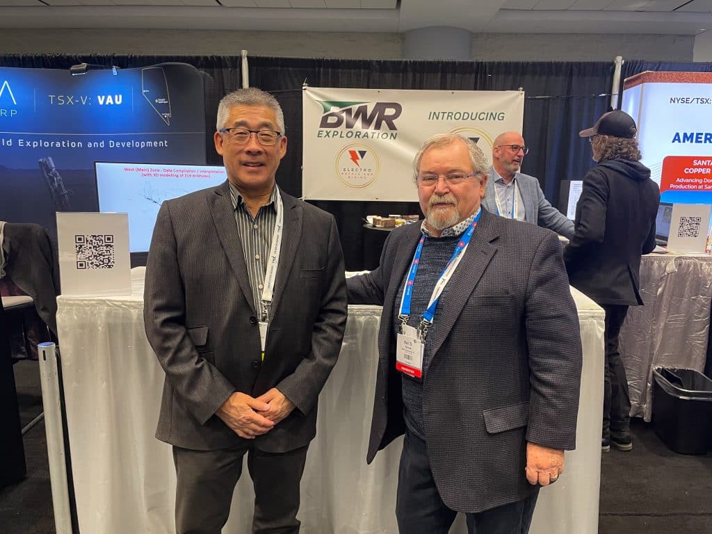 MCC staff pose with partners at PDAC
