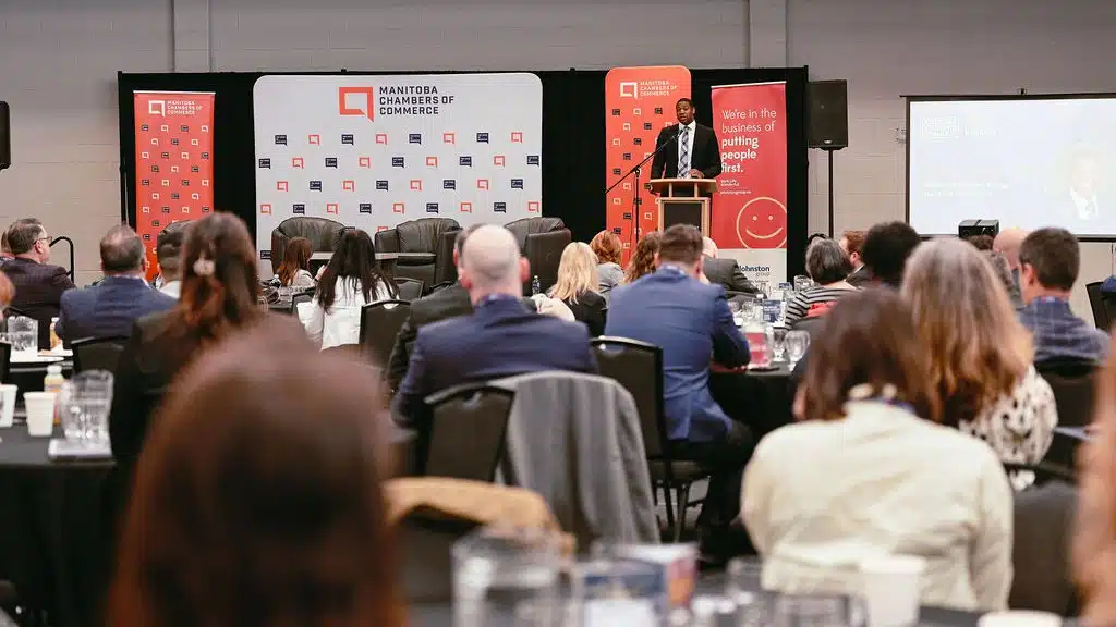 MES 2026 – 1 Minister Jamie Moses speaks to seated crowd